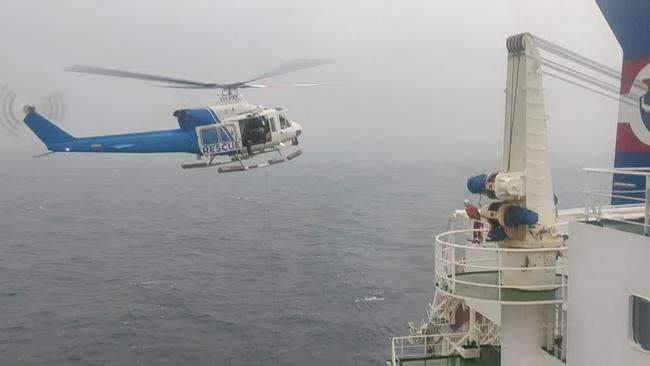 The rescue helicopter hovering over the MT Godam in the Torres Strait. Picture: Ritesh Dhamaria
