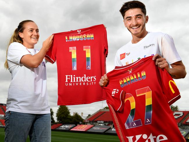 Hodgson and Cavallo with the special Pride game jerseys they’ll be wearing on Saturday in the double header at Coopers Stadium. Picture: Tricia Watkinson