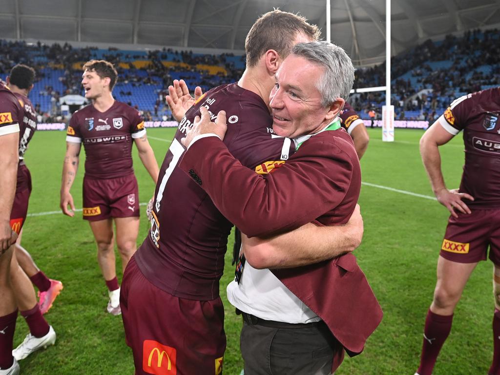 GOLD COAST, AUSTRALIA - JULY 14: Daly Cherry-Evans of the Maroons and Maroons coach Paul Green celebrate winning game three of the 2021 State of Origin Series between the New South Wales Blues and the Queensland Maroons at Cbus Super Stadium on July 14, 2021 in Gold Coast, Australia. (Photo by Bradley Kanaris/Getty Images)