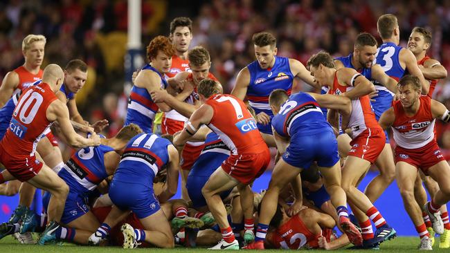 AFL Round 4. 14/04/2018. Western Bulldogs vs Sydney Swans at Etihad Stadium. Melee before the opening bounce   . Pic: Michael Klein