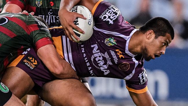 Payne Haas (right) of the Broncos is tackled by Robert Jennings of the Rabbitohs during the Round 8 NRL match between the South Sydney Rabbitohs and the Brisbane Broncos at ANZ Stadium in Sydney, Thursday, April 26, 2018. (AAP Image/Brendan Esposito) NO ARCHIVING, EDITORIAL USE ONLY