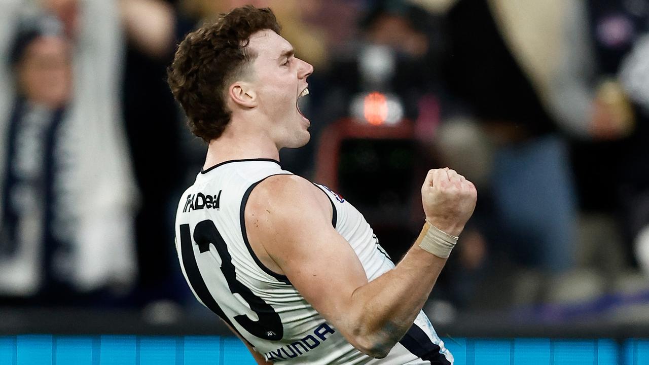 Blake Acres celebrates his second goal in the semi-final win over Melbourne on Friday night. Picture: Michael Willson / Getty Images