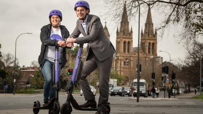 Beam Scooters’ Nicole Ricciardi and Head of Operations Locky Cooper on the King William St bridge. Picture: Brad Fleet