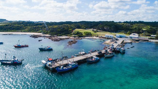 Currie is King Island's largest town, set on a scenic harbour with amazing views of the vast Southern Ocean.Located in a sheltered harbour on King Island's west coast, Currie has a history of shipwreck salvage, agriculture and fishing, with a sleepy seaside village atmosphere. Picture: Tourism Tasmania/ Stu Gibson.