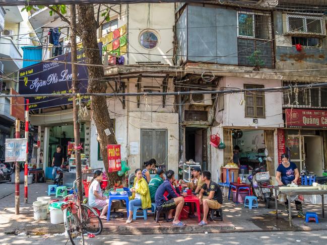 Hanoi,Vietnam - October 31,2017 : People can seen having their food beside the street in the morning at Hanoi, Vietnam.Escape 27 August 2023Why I travelPhoto - iStock