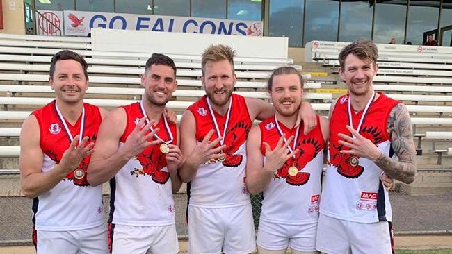 Brad Kirk (centre) with fellow four-time premiership Falcons Daniel Butcher, David Kearsley, Sam Osmond and Mitch Fazekas. Picture: Supplied