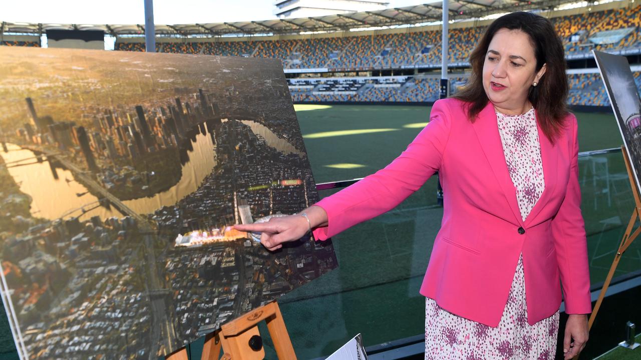 Premier Annastacia Palaszczuk with at artist’s impressions at an Olympics media conference at the Gabba. Picture: NCA NewsWire/Dan Peled