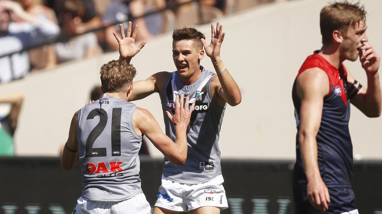 Xavier Duursma celebrates a goal with fellow rookie Connor Rozee on Saturday. Picture: AAP Image/Daniel Pockett