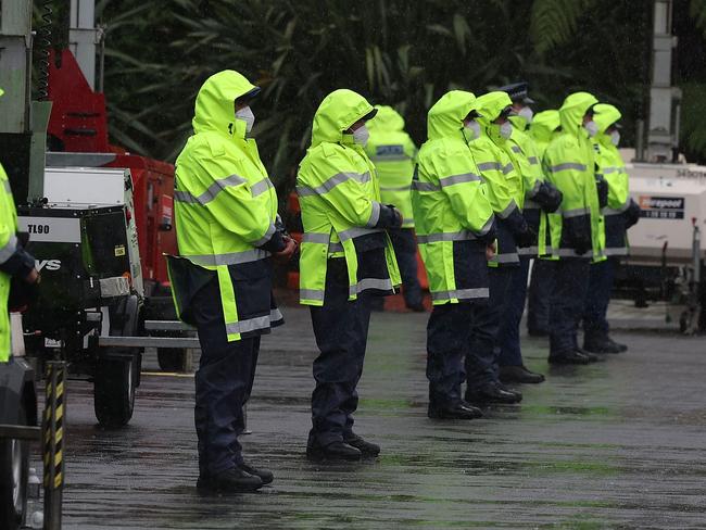 Police stand in the rain as they guard Parliament on the fifth day of demonstrations against Covid-19 restrictions in Wellington, inspired by a similar demonstration in Canada. Picture: AFP