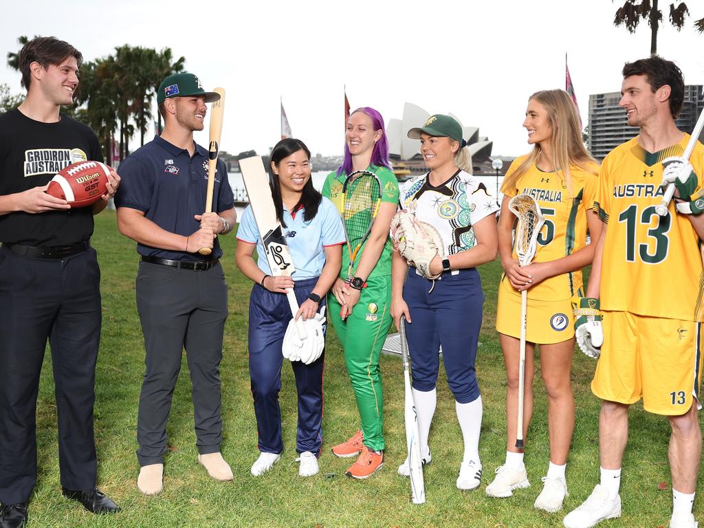 SYDNEY, AUSTRALIA - OCTOBER 17: Atlhetes representing program sports for the Los Angeles 2028 Olympic Games pose for photographs, (from left to right) Cayden Close, Gridiron, Jake Burns, Baseball, Lauren  Kua, Cricket, Jess Turnbull, Squash, Taylah Tsitskronis, Softball and Olivia Parker and Campbell Mackinnon, Lacrosse,during a media opportunity at Museum of Contemporary Art on October 17, 2023 in Sydney, Australia. (Photo by Mark Evans/Getty Images for the AOC)