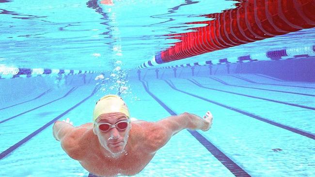 AT TRAINING: Brendan Burkett gets a few laps in, in 2002.