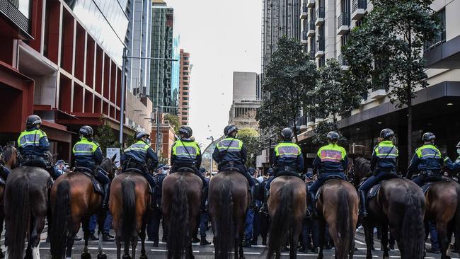 Police try to steer protesters during an anti-lockdown protest in Sydney. Picture: NCA NewsWire/Flavio Brancaleone.