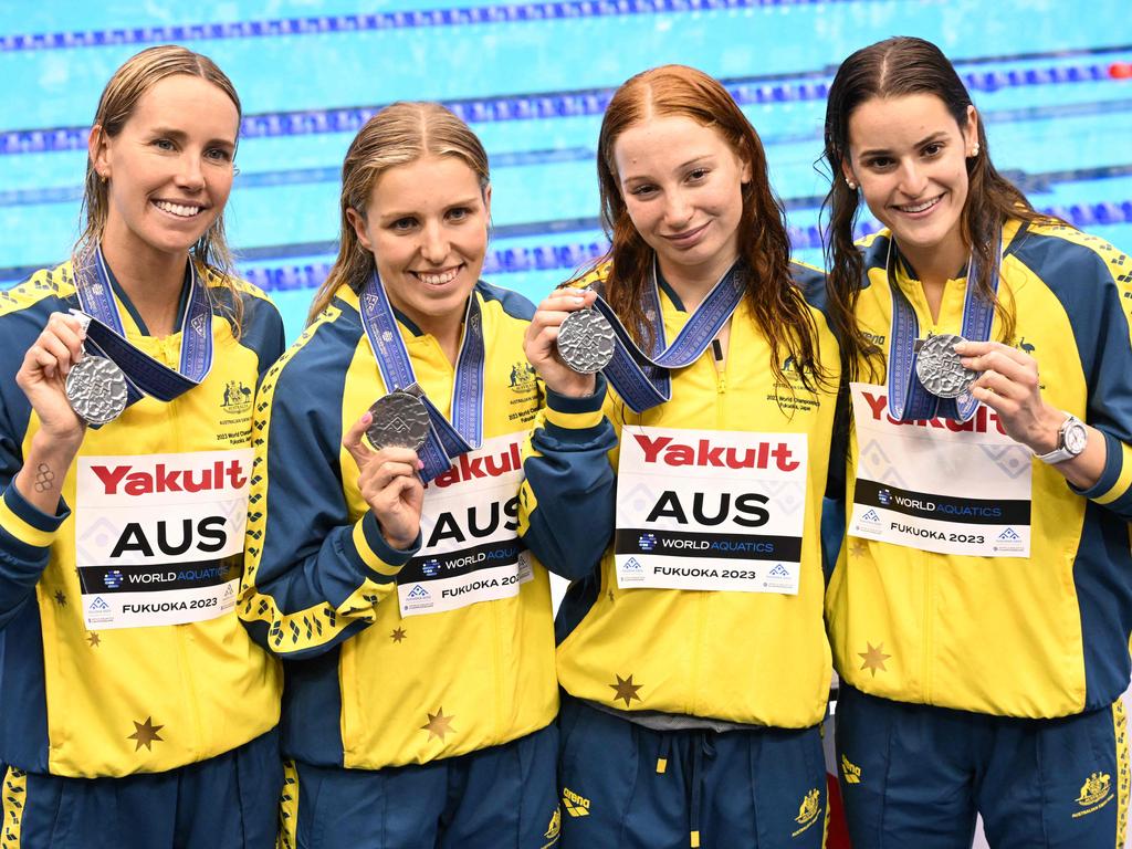 (L-R) Silver medallists Australia's Emma McKeon, Australia's Abbey Harkin, Australia's Mollie O'Callaghan and Australia's Kaylee McKeown pose during the medals ceremony for the women's 4x100m medley relay swimming event during the World Aquatics Championships in Fukuoka on July 30, 2023. (Photo by Yuichi YAMAZAKI / AFP)