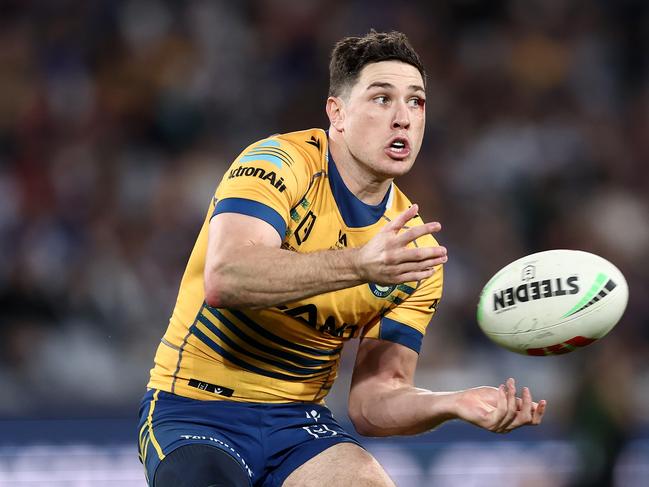 SYDNEY, AUSTRALIA - JUNE 12:  Mitchell Moses of the Eels passes the ball during the round 15 NRL match between Canterbury Bulldogs and Parramatta Eels at Accor Stadium on June 12, 2023 in Sydney, Australia. (Photo by Matt King/Getty Images)