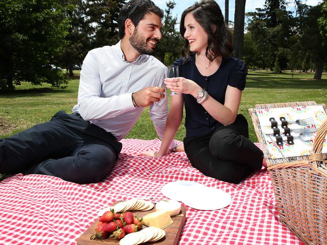 Leon Patsis 25 and Kate Mackinnon 25, both of St Peters, having a picnic date in the Botanic Gardens. Top 5 date ideas in the CBD. 10/11/16 Picture: Stephen Laffer