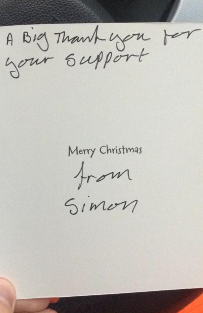 Gratitude ... The Christmas card written by Simon, a homeless Big Issue seller in England, for Lee Houghton, a business analyst who bought him coffee and croissants for four months out of kindness. Picture: UK Mirror