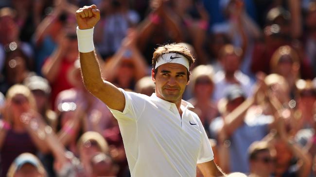 Roger Federer celebrates victory during the Men's Singles Quarter Finals match against Marin Cilic.