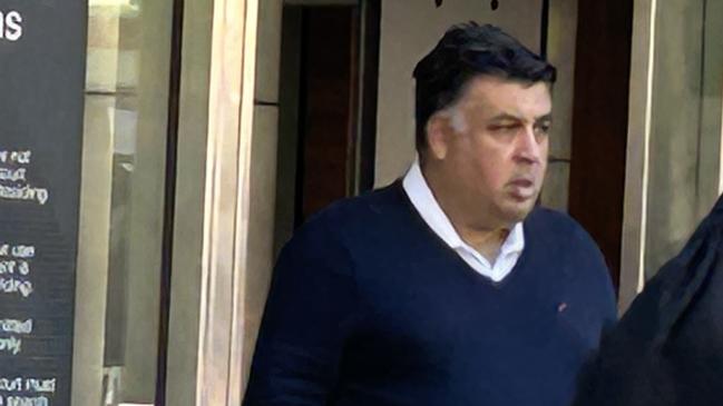 Disgraced real estate agent and auctioneer Nikolaos Haidaris leaves County Court after pleading guilty to fleecing a potential investor of more than $1m.