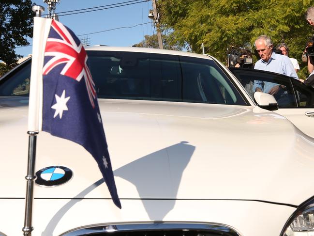 Federal Election 2016 14/5/16: Day 6 of the Federal Election campaign, getting into his bmw c1 car after holding a press conf. in alocal park after Prime Minister Malcolm Turnbull campaigned with member Craig Laundy greeting locals in a shopping strip Rochester st , in the Federal seat of Reid, Homebush, Sydney.Pic Lyndon Mechielsen/News Corp.