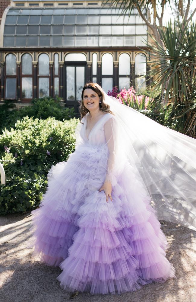 Melanie wore a stunning purple dress custom made by Melbourne designer Holly Butler. Picture: Chole May