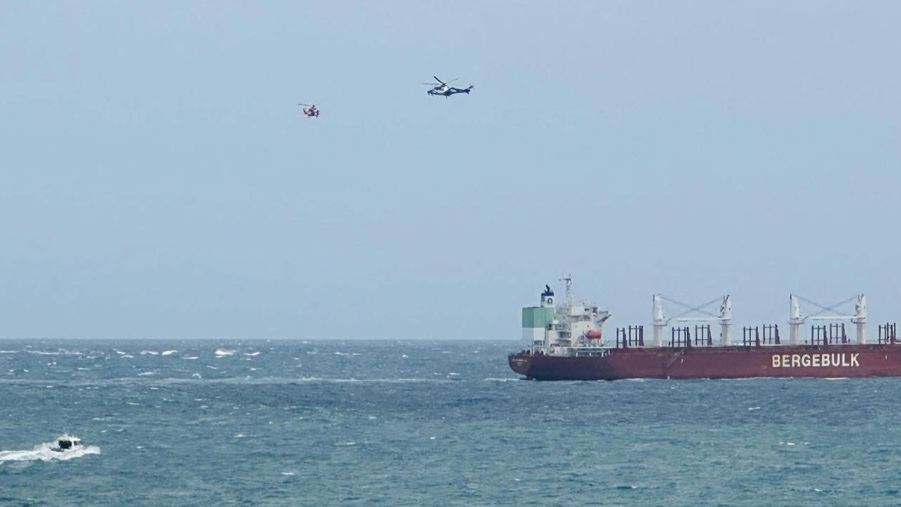 Four men rescued after boat flips off Bellarine Peninsula