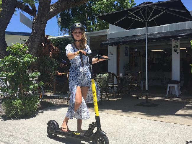 Tayla Jackson takes one of the new Ride e-scooters for a spin in Chevron Island. Photo: Talisa Eley