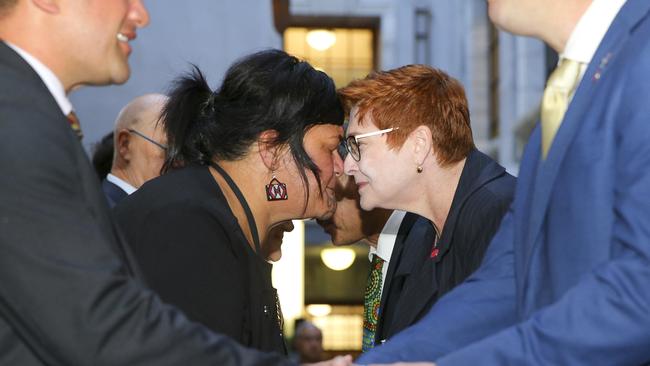 Foreign Minister Marise Payne, right, receives a hongi from her New Zealand counterpart, Nanaia Mahuta, in Wellington on Thursday. Picture: Getty Images