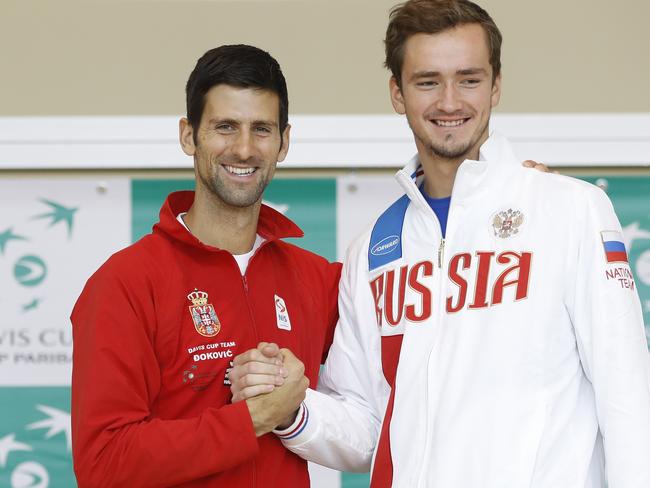 NIS, SERBIA - FEBRUARY 02: Serbia's Davis Cup team player Novak Djokovic (L) shake hands with the Russia Davis Cup player Daniil Medvedev (R) during the official draw ceremony ahead of the World Group Davis Cup tie between Serbia and Russia on February 3, 2017 in Nis, Serbia. (Photo by Srdjan Stevanovic/Getty Images)