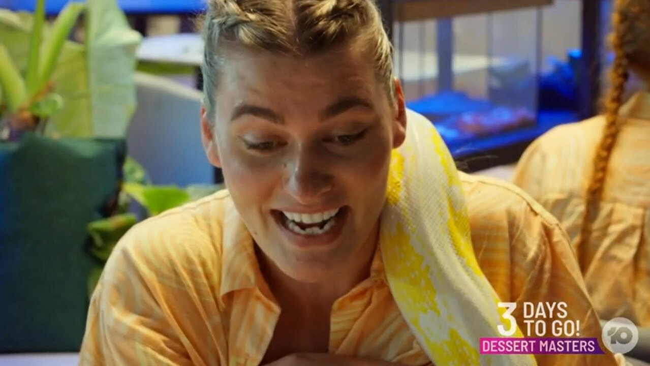 Emma's sister couldn't hold back her tears when the python went in for a snuggle. Picture from Channel 10.