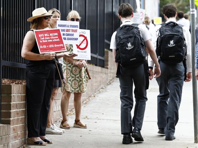 Parents stage a silent protest against the proposed transition of Newington to a co-ed school. Picture: Richard Dobson