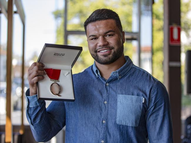 Tai Ford with his Alec Evans Medal. Picture: QRU/Brendan Hertel