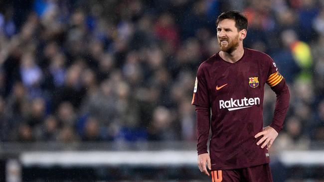 Barcelona's Argentinian forward Lionel Messi grimaces after missing a penalty kick