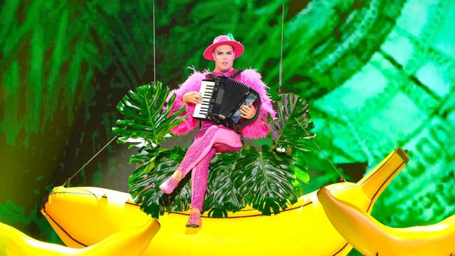 Hans rides a giant banana - as you do- during one of his many performances on America's Got Talent.