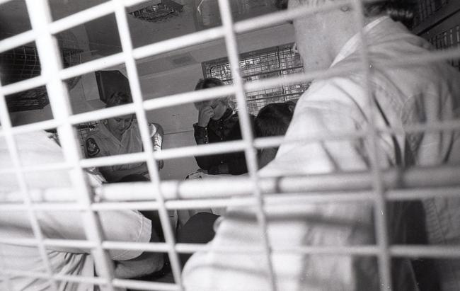 Wendy Lange with Brian Idiens and Dennis Garner in a prison van on their way to serve a life sentence for the murder of Geoffrey Lange. . Picture: Patrick Hamilton