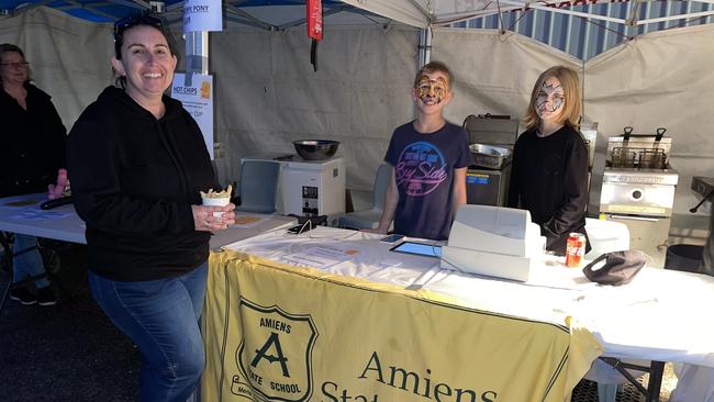 Amiens State School Parents and Citizens President Sonia Kent with students Ethan Kent (11) and Jazmin Swader (11) at their hot chips stall at the Snowflakes in Stanthorpe 2021 festival. Photo: Madison Mifsud-Ure / Stanthorpe Border Post