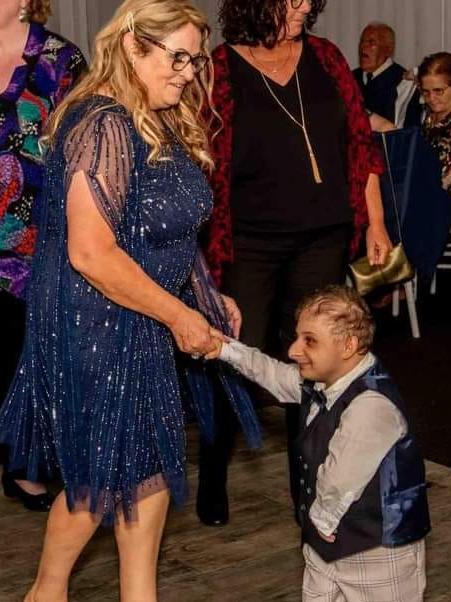 Tributes are flowing for Leo Lagana, a man with primordial dwarfism who died at age 22. Pictured with his mother. Picture: Facebook