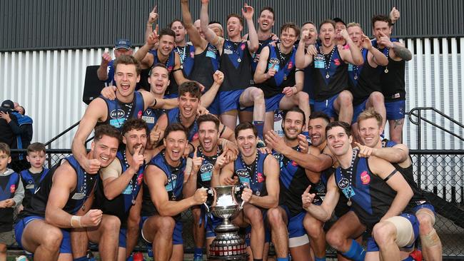 Uni Blues celebrate with the trophy after VAFA (Premier) Grand Final: University Blues v St Kevin's on Sunday, September 22, 2019, in Elsternwick, Victoria, Australia. Picture: Hamish Blair