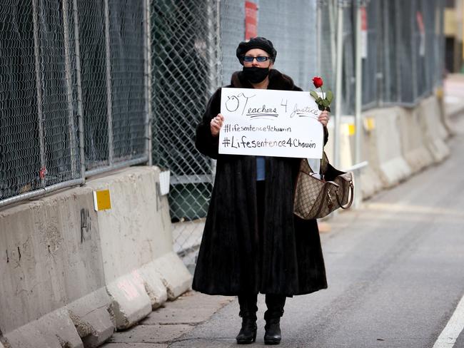 An activist walks along Hennepin County Government Center as the trial for former Minneapolis police officer Derek Chauvin continued. Picture: AFP