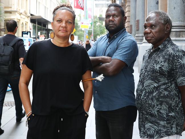 15/12/23: Tiwi islander elders, Antonia Burke, Simon Munkara and Pirrawayingi Puruntatameri protesting the NAB AGM over the bank's funding of Santos' gas projects in the NT. John Feder/The Australian.