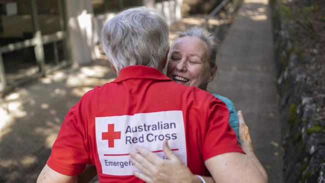Resident Vicky Harvey greets Australian Red Cross volunteer Jenny Dowell at the Recovery Centre in Lismore in the immediate aftermath of Tropical Cyclone Alfred. Picture: Supplied
