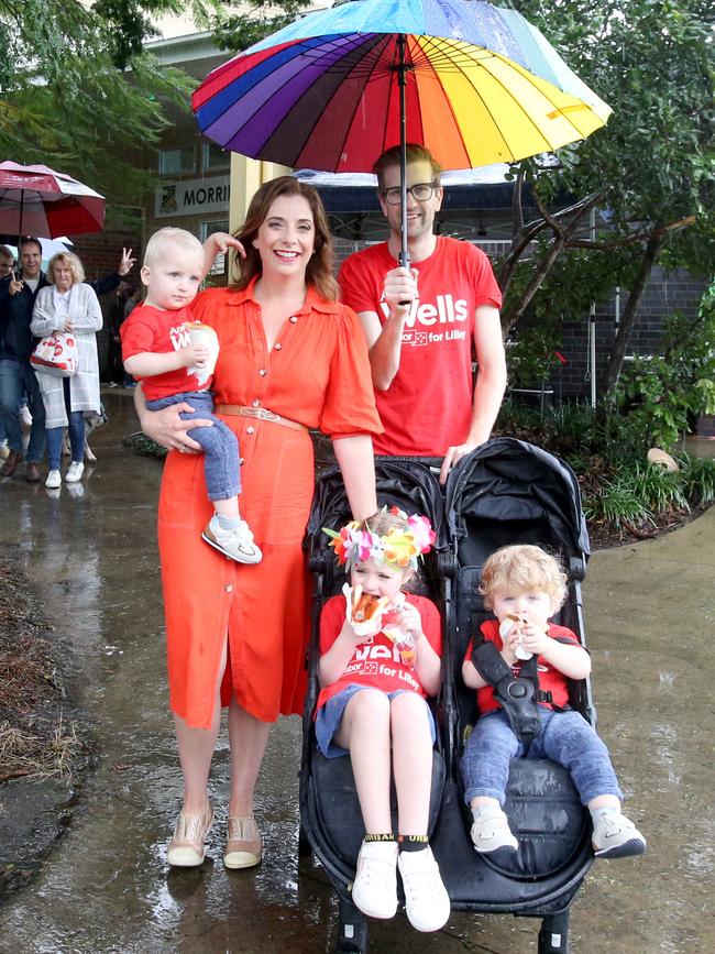 Anika Wells arrives at a polling booth with her family. Picture: Steve Pohlner