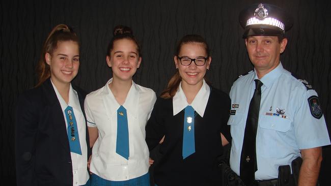 Water Police Yeppoon Senior Constable Grant Kerlin with his daughters Montana, Holly and Faith. Picture: Contributed