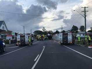 ROLLED: Emergency services at the scene of a truck collision at Junction Hill which left a truck on its side. Picture: Kathryn Lewis