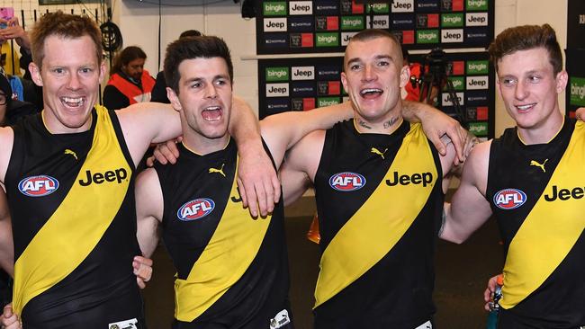 Jack Riewoldt (from left), captain Trent Cotchin, Dustin Martin and Connor Menadue celebrate after their Round 14 win against Carlton at the MCG. Picture: Getty Images