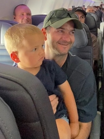 Three-year-old Alfie, with dad Dan Petherick, didn’t know what to make of the performance. Picture: Supplied