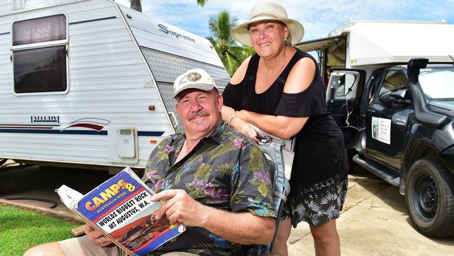 Brad Dunn and Maria Augustus-Dunn in front of their camping rig. Picture: Shae Beplate.