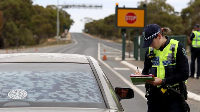 SA police at the border, which was closed in late March. Picture: AAP/Kelly Barnes