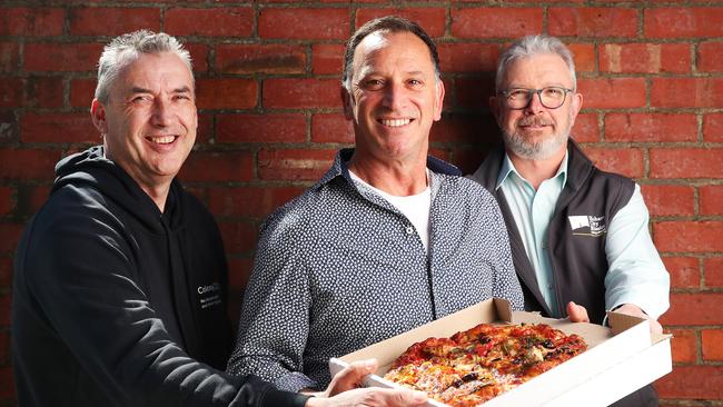 From left, Danny Sutton, from Colony 47, Angelo Fraraccio, of Da Angelo's, and Hobart City Mission’s John Stubley. Picture: NIKKI DAVIS-JONES