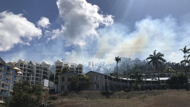 Four fire crews are battling a vegetation fire on Mount Whitsunday Dve. Picture: Elyse Wurm