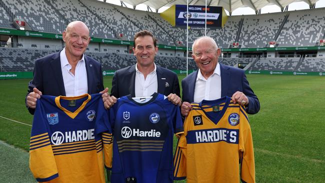 Former Eels Peter Wynn and Steve Edge with James Hardie chief executive Aaron Erter in May when the company announced it would return as the club’s major sponsor, as it was in its premiership era. Picture: Rohan Kelly